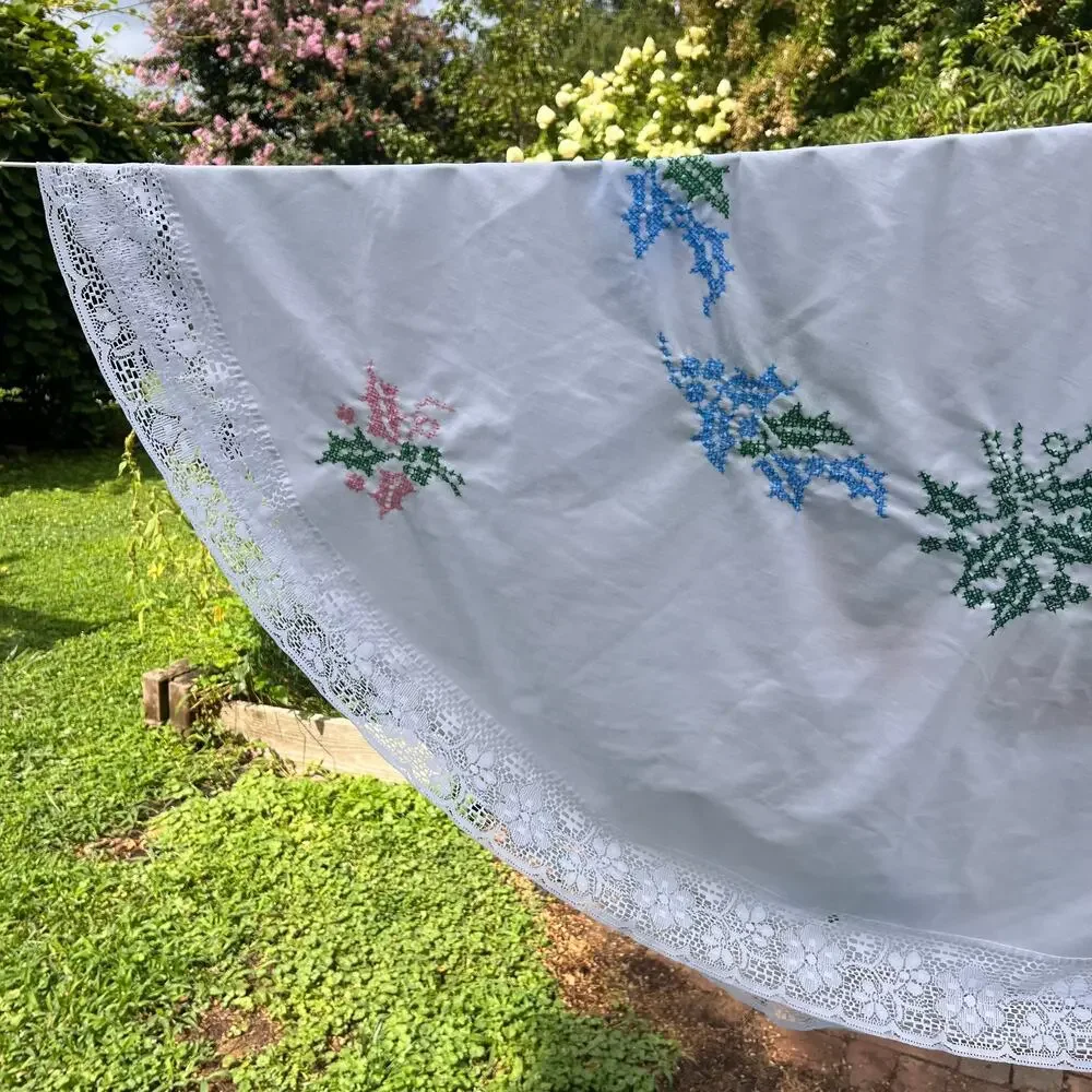 Vintage Hand Cross-Stitched Round Tablecloth 64” White Lace Trim Cottagecore
